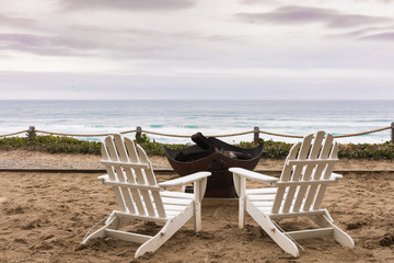 White chair overlooking beach
