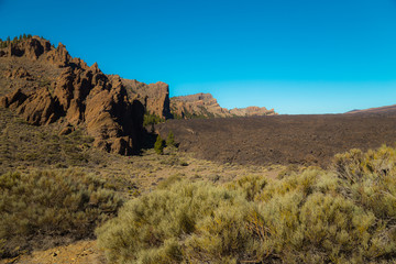 Volcano Teide and lava scenery in Teide National Park, Rocky volcanic landscape of the caldera of Teide national park in Tenerife, Canary Islands, Spain