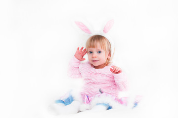 Obraz na płótnie Canvas Closeup Portrait of Blonde Baby 18 month old Girl with Big Blue Eyes and Bunny Ears headband, Pink Tutu, isolated on white background.