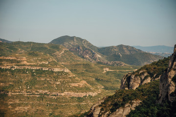 A mountain view with monastery on the top in Montserrat, Spain