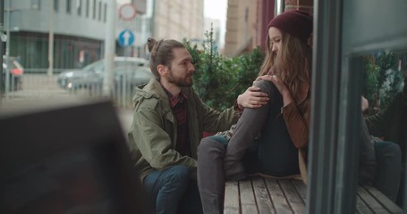 Young man comforting sad woman. Caring friend consoling upset girl. Compassion, empathy and support in relationships concept.