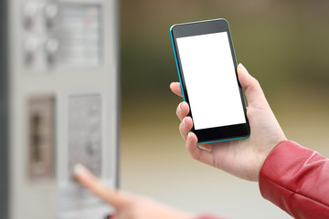Girl paying with a smart phone and showing screen