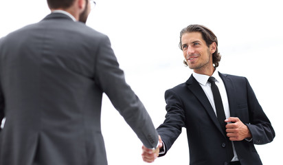 welcome and handshake of business partners