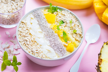Mango, Banana, Pineapple and Oatmeal Smoothie in the Bowl