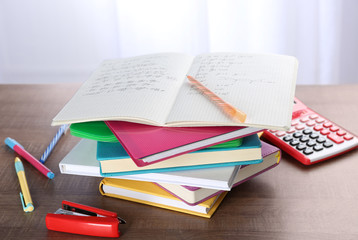 Pile of homework on table