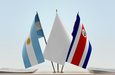 Flags of Argentina and Costa Rica with a white flag in the middle