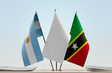 Flags of Argentina and Saint Kitts and Nevis with a white flag in the middle