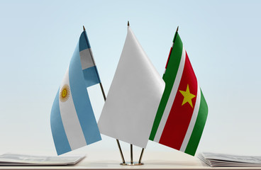 Flags of Argentina and Suriname with a white flag in the middle