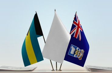 Flags of Bahamas and Falkland Islands with a white flag in the middle