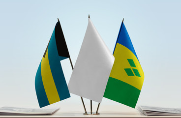 Flags of Bahamas and Saint Vincent and the Grenadines with a white flag in the middle