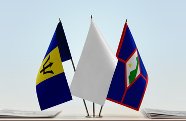 Flags of Barbados and Sint Eustatius with a white flag in the middle