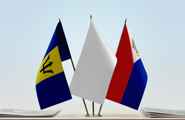 Flags of Barbados and Sint Maarten with a white flag in the middle