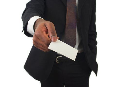 man giving businesscard suit and tie man holding card company marketing