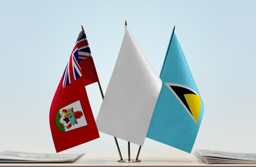 Flags of Bermuda and Saint Lucia with a white flag in the middle