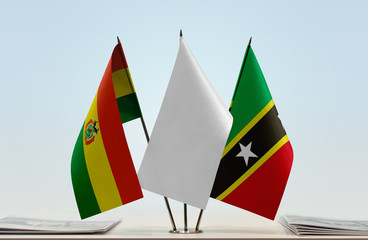 Flags of Bolivia and Saint Kitts and Nevis with a white flag in the middle
