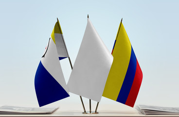 Flags of Bonaire and Colombia with a white flag in the middle