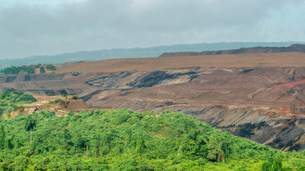 Fototapeta na wymiar Unique landscape caused by open pit coal mining activity in Sangatta, Indonesia