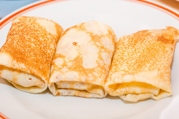 Stuffed pancakes. Pancakes with cottage cheese. Cooking pancakes. Wrap up the pancakes with cottage cheese.