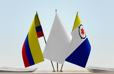 Flags of Colombia and Bonaire with a white flag in the middle