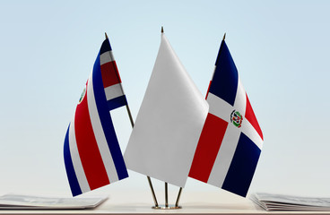 Flags of Costa Rica and Dominican Republic with a white flag in the middle