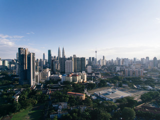 Fototapeta na wymiar Kuala Lumpur City skyline with blue sky background. Kuala Lumpur city landscape