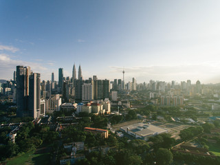 Naklejka na ściany i meble Kuala Lumpur City skyline with blue sky background. Kuala Lumpur city landscape