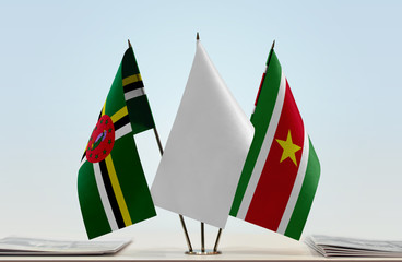 Flags of Dominica and Suriname with a white flag in the middle