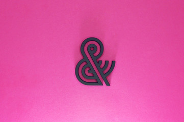 black ampersand with parallel lines on pink background - 193068354