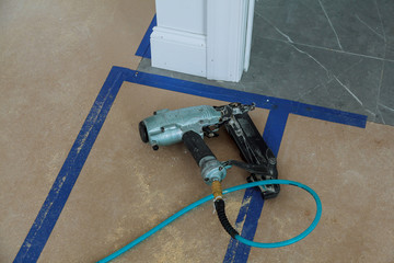 Gauge Finish Nailer man nailed slats custom house building contractor