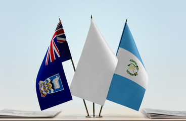 Flags of Falkland Islands and Guatemala with a white flag in the middle