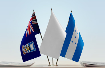 Flags of Falkland Islands and Honduras with a white flag in the middle