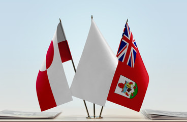 Flags of Greenland and Bermuda with a white flag in the middle