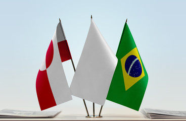 Flags of Greenland and Brazil with a white flag in the middle