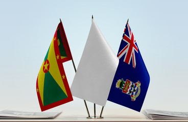 Flags of Grenada and Cayman Islands with a white flag in the middle