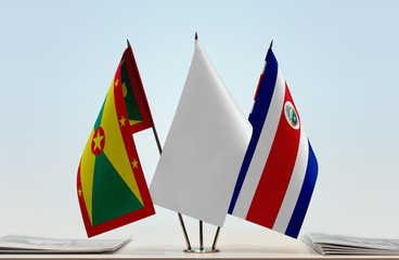 Flags of Grenada and Costa Rica with a white flag in the middle