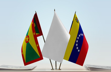 Flags of Grenada and Venezuela with a white flag in the middle