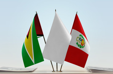 Flags of Guyana and Peru with a white flag in the middle