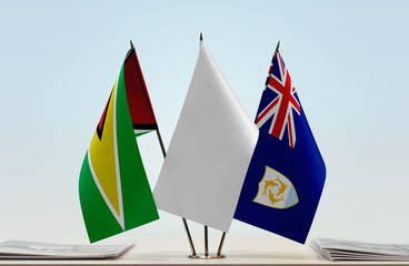 Flags of Guyana and Anguilla with a white flag in the middle