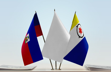 Flags of Haiti and Bonaire with a white flag in the middle