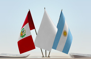 Flags of Peru and Argentina with a white flag in the middle