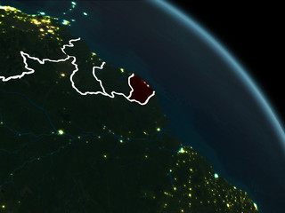 French Guiana in red at night