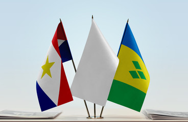 Flags of Saba and Saint Vincent and the Grenadines with a white flag in the middle