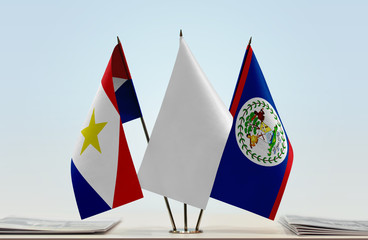 Flags of Saba and Belize with a white flag in the middle