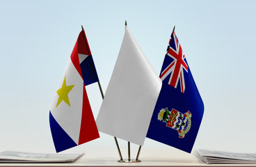 Flags of Saba and Cayman Islands with a white flag in the middle