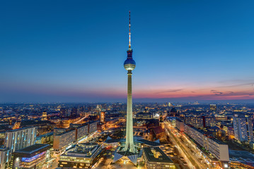 The skyline of Berlin with the famous television tower at dusk