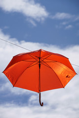 umbrella flying on a blue sky
