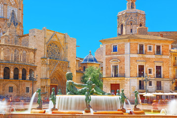 Fototapeta na wymiar Valencia Fountain Rio Turia on Square of the Virgin Saint Mary,