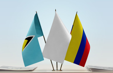Flags of Saint Lucia and Colombia with a white flag in the middle
