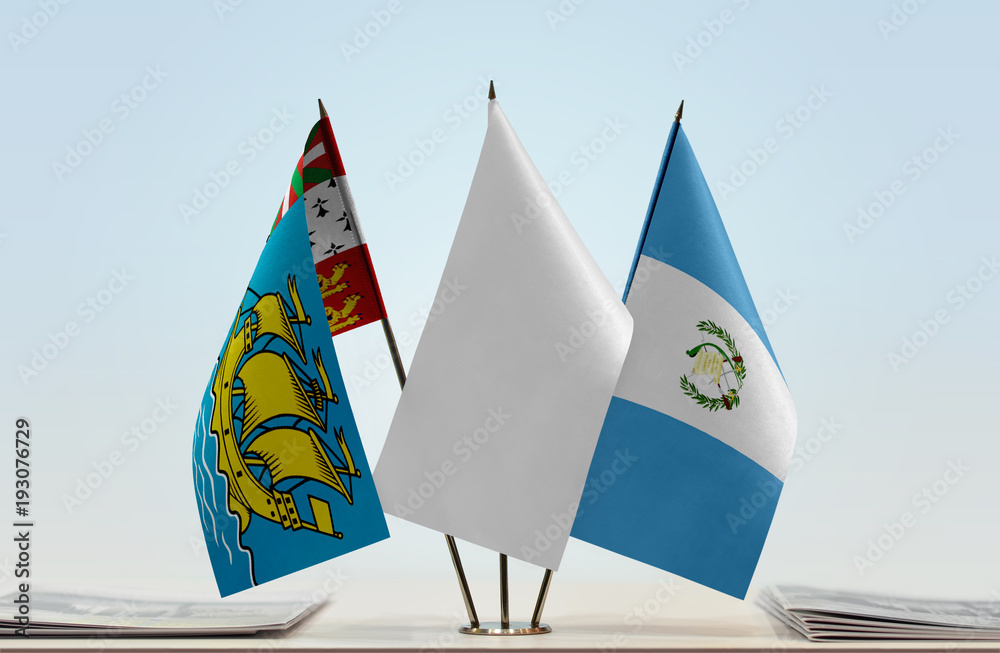 Wall mural flags of saint pierre and miquelon and guatemala with a white flag in the middle