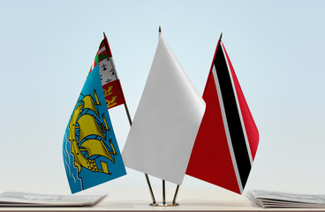 Flags of Saint Pierre and Miquelon and Trinidad and Tobago with a white flag in the middle